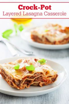 a white plate topped with layered lasagna casserole