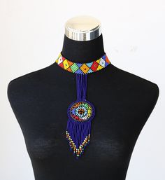 African beaded necklace, Pendant necklace, Blue Zulu necklace, Masai women jewelry, Christmas gift for her, Tribal necklace, Boho necklace 100% handmade using fine beads. Necklace width: 18 inches pendant length: 6 inches Closure: ball & joint Color: blue Available in different colors, please select in color option above. 3-5 days delivery via DHL Express The shipping fee is for the first item only and additional necklaces ship for free. To continue shopping click here: timanacrafts.etsy.com Masai Women, Zulu Necklace, African Beaded Necklace, Beaded Earrings Tutorials, Earring Tutorial, Christmas Gift For Her, Jewelry Christmas, Necklace Blue, Necklace Boho