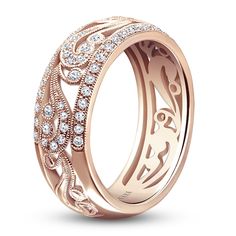 Dynamic filigree scrollwork is adorned with brilliant round diamonds through the center of this extraordinary milgrain-trimmed women's ring. 18K Rose Gold 3/8 carat round diamonds Even more fiery round diamonds border above and below the center to complete the look From the Kirk Kara Collection Jared The Galleria Of Jewelry, 18k Rose Gold, How To Take Photos, Women Rings, Round Diamonds, Diamonds, Take That, Rose Gold, Ring