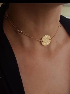 "A beautiful choker necklace designed in a boho chic style perfect for every day and evening. the necklace made from gold 24 K plated brass in very high quality and decorated with an Infiniti pendant in the side and coin in its center. chain size : 11.8\" (30cm) up to 17.7\" (45cm). pendant width: 0.98\" (2.5cm) Pendant height: 0.98\" (2.5cm) ♦ This piece of jewelry is perfect as a gift for yourself, for a friend, Valentine's day or a birthday. If you're interested in sending a gift to a third p Gold Coin Pendant Necklace For Festival, Gold Festival Choker With Clavicle Chain, Gold Clavicle Chain Choker For Festival, Festival Gold Clavicle Chain Choker, Bohemian Festival Choker With Clavicle Chain, Bohemian Clavicle Chain Choker, Gold Necklace With Coin Pendant For Festival, Bohemian Gold Coin Necklace With Round Pendant, Gold Bohemian Coin Necklace With Round Pendant