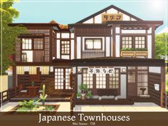 the japanese townhouses are made up of wood and white with brown trimmings