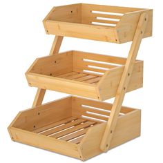 three wooden baskets stacked on top of each other in the shape of a ladder for storage