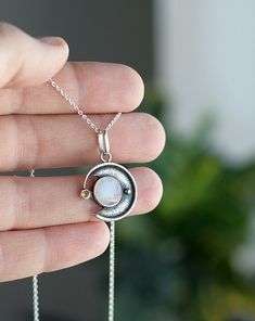 Circle shaped pendant, set with genuine clear moonstone and citrine gemstone.  The pendant measures 20mm length x 20mm width.  Diameter caboshone moonstone 10x10mm.  Diameter citrine stone - 3mm.   Sterling silver pendant will arrive to you on a cotton thread. You can order the pendant with a cable silver chain. And you can choose the length of the chain by yourself to make this set perfect.  Pendant can be Personalized, just ask me for that Jewelry is packaged suitably for gift giving for someo Silver Moon Necklace, Crescent Moon Necklace Silver, Moon Necklace Silver, Citrine Necklace, Crescent Moon Necklace, Citrine Stone, Moonstone Necklace, Citrine Gemstone, Silver Moon