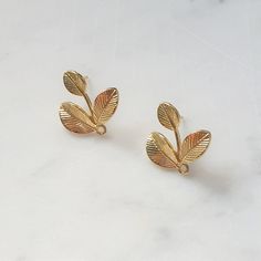 Gold Leaf Studs, gold plated alloy. Size: Approx 24 x 21mm Holes: Approx 1.6mm Quantity: 2 pairs in a pack Gold Leaf-shaped Single Earring, Gold Plated Leaf-shaped Earrings, Gold Single Leaf-shaped Earring, Gold Leaf-shaped Nickel-free Earrings, Gold-plated Leaf-shaped Earrings, Gold Leaf-shaped Hoop Earrings For Gift, Gold Leaf-shaped Earrings, Gold Leaf-shaped Jewelry For Jewelry Making, Gold Nickel-free Clip-on Earrings For Anniversary