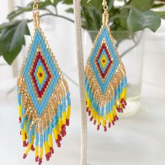 Add Some Refined Boho Vibes To Your Outfit With These Multicolor Seed Bead Tassel Earrings. Brand New Yellow Bohemian Tassel Earrings For Beach, Yellow Beaded Fringe Earrings For Festival, Yellow Fringe Dangle Jewelry, Gold Beaded Fringe Earrings For Beach, Yellow Fringe Beaded Earrings With Round Beads, Yellow Bohemian Beaded Earrings With Gold Beads, Bohemian Yellow Beaded Earrings With Gold Beads, Yellow Beaded Earrings With Fringe, Festival Yellow Beaded Earrings With Dangling Beads