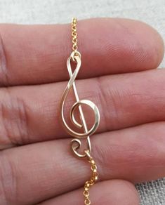 Treble Clef Necklace, Sterling Filled Wire, Treble Clef Jewelry, G Clef Necklace, Music Note Necklac Treble Clef Jewelry, Music Note Jewelry, Delicate Diamond Necklace, Treble Clef Necklace, Necklace Music, Music Note Necklace, Key Charm Necklace, Hammered Pendant, Music Necklace