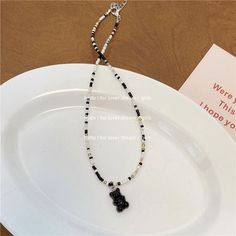 Material: Beads/Beads Style: Korean Korean Style Trendy Black Beaded Necklaces With Round Beads, Trendy Black Beaded Necklace Gift, Gift Black Beaded Chain Bracelet, Black Beaded Chain Beads As Gift, Black Beaded Bracelet As Gift, Trendy Black Necklace With Colorful Beads, Black Beaded Chain Bracelet For Gift, Black Beaded Chain For Gift, Black Necklaces With Round Letter Beads