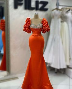 Elegant Orange Dress With Fitted Bodice, Fitted Orange Floor-length Dress, Orange Fitted Floor-length Dress, Embellished Satin Dress For Banquets, Embellished Satin Dress For Banquet, Elegant Orange Gown With Fitted Bodice, Orange Satin Evening Dress, Elegant Fitted Orange Gown, Satin Short Sleeve Banquet Dresses