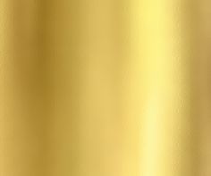 a close up view of a gold metallic background