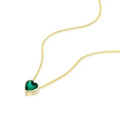 Express your love with the delicate beauty of this Emerald heart gold necklace. This stunning choker features a green gemstone pendant, in a solid gold 14K necklace, the perfect May birthstone jewelry. Product Details: ✤ Lab-grown Emerald, heart cut 6x6 mm ✤ 14K solid yellow/rose/white gold ✤ Packed in a luxurious gift box ✤ Fully Insured And Discreetly Packaged   Shipping: ✤ Free worldwide shipping. ✤ Shipped using FedEx/DHL were available, insured and trackable express shipping. ✤ Please add y Heart Cut Emerald Necklace For Gift, Green 14k Gold Heart Jewelry, Green Heart-shaped 14k Gold Jewelry, Emerald Heart Pendant Necklace As A Gift, Gold Heart-cut May Birthstone Necklaces, Heart Cut Emerald Necklaces For May Birthstone, Gold Heart Cut Necklaces For May Birthstone, Elegant Heart-shaped Green Emerald Necklace, Heart Cut Emerald Necklace For May Birthstone