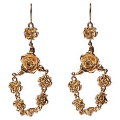 Frame your face in a delicate bouquet of rosettes! These drop chandelier earrings will add romantic glamour to any look. Match with the rosette necklace, bracelet and harness. Made in America. Plated on Brass. Additional Information: Material: 24K Gold, Brass Dimensions: W 1 x L 3 x H 0.5 in Available in other finish option: Rose gold Delicate Bouquet, Drop Chandelier, Baroque Pearl Earrings, Rose Jewelry, Rose Earrings, Rose Gold Earrings, Pretty Jewellery, Made In America, Baroque Pearls