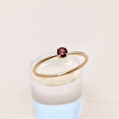 Natural Garnet Round Cut Gemstone Ring in 14k SOLID GOLD For Her from our Capsule Jewelry Collection.  Garnet Round Cut Stone is set in Prong Setting in our Factory. Gold Ring AAA+ Quality. Perfect Gift For Everyday or Gift for January Birthstone for Your Loved Ones. ►  DIMENSIONS : ◆ Gemstone : Garnet                       ◆ Stone size : 3*3 mm                           ◆ Gross Weight : 0.900 grams ◆ Shank Width : 1 mm        *  Material :  14k Yellow,White,Rose Gold      EACH Ring is Stamped W Fine Jewelry Yellow Gold Garnet Ring, Yellow Gold Garnet Ring Fine Jewelry, Garnet Birthstone Promise Ring In Fine Jewelry Style, Yellow Gold Garnet Rings With Prong Setting, Dainty Garnet Gemstone Rings, Yellow Gold Garnet Rings, Yellow Gold Garnet Rings With Round Cut, Garnet Birthstone Ring In Fine Jewelry Style, Yellow Gold Garnet Promise Ring