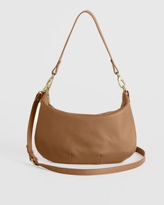 Buttery soft, perfectly slouchy and entirely timeless, our crescent shoulder bag is the perfect tote to add into your everyday purse rotation. And the goes-with-anything piece (crafted from 100% Italian leather) features two detachable straps, allowing yo