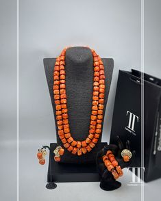 this set come with two tier necklace, two bracelet, a per of earrings & a ring.  -- Our stunning Coral Bead Necklaces and handmade accessories are a perfect choice for anyone searching for a unique and eye-catching piece of jewellery. This ethnic necklace is ideal for fashion-forward individuals, who want to add a touch of elegance to their ensemble. Crafted from high-quality coral beads, this African beaded necklace features an intricate design that is a perfect reflection of the rich African c African Beaded Necklace, African Traditional Wedding, African Traditions, Coral Beads Necklace, Tiered Necklace, Bead Necklaces, Ethnic Necklaces, Beads Handmade, African Culture