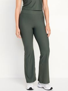 hidden front pocket go-dry wicks moisture extra high waist is 1" higher than standard high rise sits above belly button fitted hip and thigh hits below ankle 31 1/2" regular inseam 29 1/2" petite inseam 35 1/2" tall inseam models are approx.  5'9" and wear sizes s (4), l (12), and xl (18)machine wash according to the care instruction label Flare Leggings, Wicks, Belly Button, Toddler Boys, Front Pocket, Old Navy, High Waist, High Rise, High Waisted