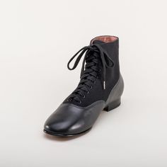 If you could only choose one boot for the broadest period of historic dress, the Larkspurs should be it! This faithful reproduction wool and leather bootie is accurate for a staggering 130+ years, from c. 1810 all the way through the 1930s. Advertised as warm and comfortable, practical, and even "healthy and sanitary," advertisements for these wool felt and leather boots were a standard in catalogs from the 1890s well into the 1930s. The style itself is significantly older, shown in illustration American Duchess, Cuban Heels, Calf Muscles, Paris Woman, Leather Lace Up Boots, Black Boots Women, Historical Dresses, Black American, Rubber Heels