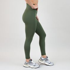 Finding the right fit for your body type is no easy feat, but we're here to help. Introducing the 23" El Toro leggings, designed to fit with a 7/8 length fit for petites and a perfect crop length for taller ladies over 5'4". Bronze Green is warm & robust. It’s no secret, we’re big fans of rich green hues, and Bronze Green is an infusion of life into our collection. A true anchor in every outfit, we love these El Toros with blues, grays, and especially black! 4.5" tall waistband Tight fit Lined t Tight Workout Pants With 5-inch Inseam, High Rise Tight Athleisure Leggings, Tight High Rise Athleisure Leggings, Compression Athleisure Leggings With 5-inch Inseam, Sporty High-rise Compression Tights, Sporty High Rise Compression Tights, Sporty Compression High-rise Tights, Full-length Compression Leggings For Athleisure, Sporty Tight Mid-rise Leggings