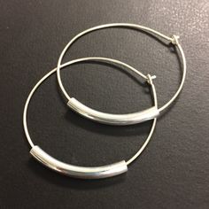 1 1/2 inch Sterling silver hoop earrings. Handcrafted. Simple, classic, timeless. Curved tubes (available in silver, shiny gold or antique gold) are threaded onto 1 1/2 inch diameter handcrafted sterling silver hoops. Earrings Features: * Extremely lightweight! * Measure 1 1/2 inch diameter * Minimalist, Dainty and Unique * Best Sellers, very popular design * Inspired by the one and only Joanna Gaines from Fixer Upper. These seem right up her alley! Plastic backs are provided with every pair and Adjustable Small Hoop Earrings Nickel Free, Nickel-free Hoop Jewelry, Adjustable Nickel-free Hoop Earrings, Small Hypoallergenic Metal Hoop Earrings, Hypoallergenic Adjustable Hoop Earrings, Adjustable Hoop Earrings With Ear Wire, Adjustable Small Hoop Beaded Earrings, Nickel-free Small Metal Hoop Earrings, Adjustable Hoop Earrings For Everyday