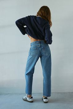 ‘90s-inspired Levi's® jean in loose straight-leg fit. Designed in a classic rigid, non-stretch denim featuring a mid-rise waist and a baggy straight-leg fit that crops at the ankle for an effortless finish. Features Levi's® 501 ‘90s ankle jeans Mid rise straight jeans Rigid non-stretch denim Mid rise waistline Baggy fit through hips and thighs Crops at the ankle 5-pocket styling Zip fly and button closure Content + Care 100% Cotton Machine wash Imported Size + Fit Mid rise Straight leg Ankle len Levis Women Outfits, Levi 501 Jeans Women, Mid Rise Jeans Outfit, 90s Jeans Outfit, Levi Jeans Outfit, Levis 501 Women, Cropped Outfits, Straight Jeans Outfit, Levi 501s