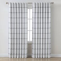 an image of curtains on the web page for home decor and furniture store, which is open