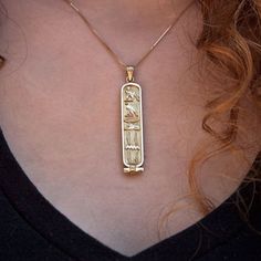 Get your name translated into hieroglyphs to make your own Personalized 14k Cartouche Pendant Necklace. Your traditional piece of jewelry will be custom-made, by hand, in the ancient bazaar of Khan el Kalili in the heart of Cairo, Egypt. The solid style gives the hieroglyphics a classic, embossed look.At checkout, leave an Order Note of the name/word you would like translated. Sizes: Small (2-3 Symbols), 1.5" L Medium (4-5 Symbols), 1.75" L Large (6-7 Symbols), 2" L X-Large (8-9 Symbols), 2.25" Egyptian Cartouche Necklace, Egypt Necklace, Traditional Nameplate Jewelry, Cartouche Necklace, Egypt Jewelry, Egyptian Tattoo, Egyptian Hieroglyphics, Egyptian Jewelry, Jewelry Fashion Trends