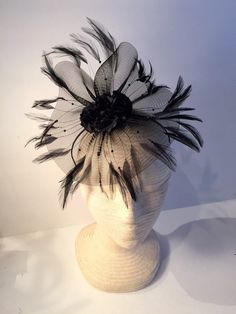 Black fascinator- flower headband- wedding- derby- Polo headpiece- feather- Mad hatter- Tea party- Lady's who Lunch. Hello, This black horse hair netting/ fascinator has a cluster of 3 inch of flowers on top. This flower is edged with a ring of black feathers. (It's not horse hair but a hundred years ago it was woven from horse hair and the name stuck) It's on a skinny 1/8 inch black satin covered headband that is adjustable to fit any head size and very comfortable...plus no hat head! --------- Derby Headpiece, Fascinator Hats Diy, Flower Headband Wedding, Feather Headpiece, Black Fascinator, Ladies Who Lunch, Headband Wedding, Fascinator Headband, Cocktail Hat