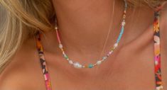 This necklace is the perfect pop of color for your summer dinner out or for lounging around the beach. The touch of pearls give it a classier feel which making it easy to dress it up or down. Party Beaded Strand Jewelry, Summer Party Beaded Necklaces With Round Beads, Trendy Beaded Chain Pearl Necklace For Party, Trendy Beaded Pearl Necklace For Party, Spring Beach Beaded Necklaces With Round Beads, Multicolor Summer Jewelry, Pearl Strand Beaded Necklaces For Beach, Trendy Summer Jewelry With Pearl Chain, Casual Vacation Beaded Necklaces With Beaded Chain