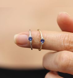 Three stones sapphire with diamond prong setting ring. Simple classic diamond ring ❮❮ Details ❯❯ ◆ Handmade in our Manhattan Studio. ◆ Center Stone : 100% Natural Emerald , approx. 0.17~0.19carat ◆ Side Stones : Diamond, Approx. 0.04 total carat weight − Conflict-Free − Diamond Color : G − Diamond Clarity : SI1 ◆ Band Width : Approx. 1.25mm Round ◆ Material : 14K Yellow Gold,Rose Gold, White Gold. ◆ Sizes available : 3 - 9 (Pls send us convo for over size 9, Priced upon request) ✔︎ Make sure to Luxury Minimalist Sapphire Ring, Dainty Sapphire Birthstone Ring For Promise, Dainty Sapphire Diamond Ring For Anniversary, Three Stone Sapphire Round Ring Fine Jewelry, Dainty Sapphire Ring With Round Cut, Promise Sapphire Diamond Ring, Anniversary Three-stone Diamond Sapphire Ring, Fine Jewelry Three-stone Sapphire Ring, Dainty Round Sapphire Ring With Diamond