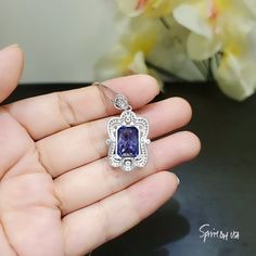 "Large Tanzanite Jewelry Rectangular Royal Flower Style Unique Artisan design Full Sterling Silver Made Luxury Gemstone Jewelry ◆◆Pendant Main stone:10*14mm Created Tanzanite 10CT Pendant Height ( include bail) : 30.9mm Pendant Holder (bezel & Bail) : White Gold Coated fine 925 Sterling Silver Accent Stone: Sim Diamond ◆◆ Necklace chain : Platinum gold coated 925 sterling silver Chain with length option from 16\" ~ 20\". The model wearing 18\". 16 inch ≈ 40cm 18 inch ≈ 45cm （Most popular siz Royal Diamond, Tanzanite Pendant, Gemstone Pendant Jewelry, Tanzanite Necklace, Tanzanite Jewelry, Flower Style, Flower White, Blue Tanzanite, Diamond Flower