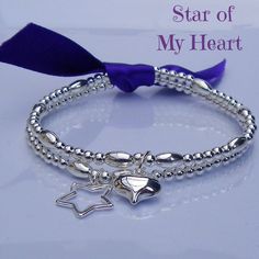 Our unreserved best seller here at Gemme! A gorgeous bracelet set that makes a great stack filler or a thoughtful gift Made with sterling silver round and oval beads One bracelet finished with a puff heart charm One bracelet finished with an open star charm All Sterling Silver Made to approximately 18cm but can be made to any size on request Elegant Silver Beaded Bracelets For Birthday Gift, Valentine's Day Silver Jewelry With Star Charm, Silver Beaded Bracelets For Mother's Day And Birthday Gifts, Silver Beaded Bracelet With Star Charm And Round Beads, Silver Beaded Bracelets With Star Charm, Silver Beaded Bracelets With Heart Beads For Gift, Silver Charm Bracelet With Heart Beads For Friendship, Silver Beaded Bracelet With Star Charm As Gift, Silver Beaded Bracelet With Star Charm For Gift