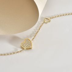 Celebrate the bond of love and friendship with our stunning 14K Solid Gold Heart Bracelet. Crafted with precision and elegance, this bracelet features a delicate heart design, symbolizing affection and connection. Made from high-quality 14K solid gold, it's a timeless piece of jewelry that radiates beauty and sentiment. Perfect for gifting to a friend or loved one, this bracelet is a meaningful expression of love and appreciation. Whether it's for Mother's Day or any special occasion, this uniqu Luxury Sterling Silver Heart Bracelet For Anniversary, Luxury Sterling Silver Bracelets For Valentine's Day, Luxury White Gold Heart Bracelet, Diamond Heart Bracelet For Valentine's Day, Elegant Heart Cut Diamond Bracelet For Valentine's Day, Elegant Diamond Bracelet For Valentine's Day, Luxury White Gold Bracelet With Heart Charm, Luxury Wedding Heart Bracelet With Heart Charm, Elegant White Gold Heart Pendant Bracelet