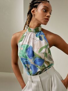 Crafted from crepe de chine, Praslin Silk Top features a mock neck and sleeveless cut. The eye-catching botanical pattern perfectly complements the beach-inspired design, adding a touch of whimsy and vibrant energy to your wardrobe. Silk Halter Top, Silk Comforter, Silk Bedding Set, Silk Clothes, Silk Nightwear, Painting Floral, Silk Knit, Stripe Silk, Botanical Pattern