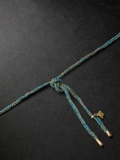 Carolina Bucci's necklace is made from gold chains hand-braided with turquoise silk. It's finished with a bee charm that symbolises sprezzatura , the studied elegance for which the Italians are renowned. The 'Lucky' collection is inspired by friendship jewellery, so this would make a thoughtful gift for the stylish man in your circle. Carolina Bucci, Silk Necklace, Stylish Man, Friendship Jewelry, Bee Charms, Necklace For Men, Fine Jewellery Necklace, Modern Man, Mr Porter