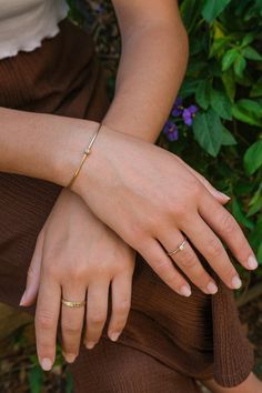 Solid 14K Brushed Yellow Gold Bangle, Set with a Natural Diamond. Made from Handmade Solid Gold Wire. NOT HOLLOW! Beautiful Delicate Bangle Handmade Just for You. For Everyday Wear or for a Special Occasion.  Special Delicate Gift ♦ DETAILS ♦ * Material: 14k Yellow Gold  * Cuff Size: Approximately 1.5mm thick. All together this cuff weighs approximately 4 grams. * Finish: Brushed Gold. Matte * Diamond Weight: Approx 0.10 Ct (about 3mm) * Diamond Quality: VS quality, F/G in color. ♦ Cuff Measurements ♦ 6.29 In about 16 cm 6.69 In about 17 cm 7.08 In about 18 cm 7.48 In about 19 cm 7.87 In about 20 cm 8.26 In about 21 cm ♦ NOTES ♦ * We Do Not Use diamonds that have been through Any Kind of treatment! Only Natural Diamonds! * This Bracelet can be made with a different gemstone. * Also availab Delicate Bracelet Gold Bangles, Gold Bracelet In 5 Grams For Women, Everyday Gold Bracelet For Women, Single Bangles Gold, Daily Wear Bracelets For Women Gold, Gold Bangles Aesthetic, Single Gold Bangle Designs, Daily Wear Bangles In Gold, Single Bangle Designs Gold