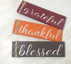 three wooden signs that say grateful, grateful and grateful