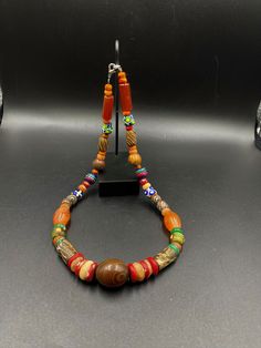 The Beautiful Vintage Antique Necklace Consist Of Glass , Carnelian ,Banded Agate and Cylinder Seal Stamp Beads Probably From 19 Century Unique Old Antique Vintage Jewelry Beads Necklace Multicolor Carnelian Necklaces With Polished Beads, Multicolor Carnelian Hand-strung Jewelry, Handmade Multicolor Carnelian Beads, Gems, And Cabochons, Artisan Multicolor Carnelian Necklace, Multicolor Carnelian Jewelry With Large Beads, Multicolor Carnelian Beaded Necklace With Large Beads, Multicolor Carnelian Beaded Necklaces With Large Beads, Brown Agate Necklaces With Colorful Beads, Traditional Adjustable Agate Beads