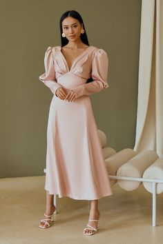 Fabric: Heavy Satin Cotton 50%, Polyester 50% V-neck dress Puffed sleeves Long sleeves Bow on back detail Zipper on back Dress lenght: 125 cm/ 49,2 inSleeve length: 68 cm/ 26,7 in Colors: White, Sky-Blue, Dusty Pink Chic V-neck Dress With Elastic Sleeves, V-neck Dress With Elastic Sleeves For Brunch, Chic Dresses With Structured Shoulders And Lantern Sleeves, Chic Knee-length V-neck Dress With Gathered Sleeves, V-neck Maxi Dress With Gathered Sleeves For Brunch, Elegant V-neck Midi Dress With Elastic Sleeves, Elegant Fitted V-neck Dress For Brunch, Long Sleeve Ruched Midi Dress With Fitted Bodice, Ruched Long Sleeve Midi Dress With Fitted Bodice