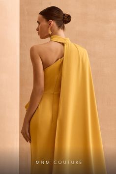 MNM Couture V02033 Fall 2024 evening collection dress. Evening Gown With Cape, Cape With Collar, One Shoulder Evening Gown, Gown With Cape, Mnm Couture, Couture Evening Dress, Plastic Dress, One Shoulder Gown, Asymmetric Neckline