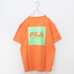 A T-shirt with a simple FILA logo design.
 One size fits all and can be worn by both men and women.

 A FILA T-shirt series featuring models worn by global artist BTS.

 One size: Length 67cm Shoulder width 45cm Sleeve length 21cm Bust 106cm Hem width 54cm

 Body: 100% cotton
 Rib: 95% cotton, 5% polyester

 Notes: ■Size: Actual dimensions are measured when laid flat. Please note that there may be slight differences in size depending on the material.

 ■Regarding color: Please note that the col Green Cotton T-shirt With Logo, Urban Short Sleeve Logo T-shirt, Urban Style Short Sleeve Logo T-shirt, Green Casual Logo T-shirt, Casual Green Logo T-shirt, Green Casual T-shirt With Logo, Urban Short Sleeve Top With Logo, Orange Crew Neck T-shirt With Logo Print, Orange Graphic T-shirt For Streetwear