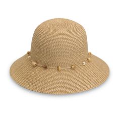 Naomi Women's Sun Protection Pick a location — any location — and the Naomi is ready to come along with a packable design, UPF 50+ protection, and lightweight, versatile style meant to complement your travel wardrobe. An effortless, warm-weather design comes through natural woven fibers in earthy tones of brown, which we accent with a sweet, peek-a-boo brim . A round crown and sloped shape enhance its easygoing character while providing shade for your face and neck against UV rays. From beach da Leopard Print Headband, Straw Fedora Hat, Wide Brim Sun Hat, Straw Fedora, Sun Protection Hat, Hit The Road, Women's Beanie, Travel Wardrobe, Beaded Trim