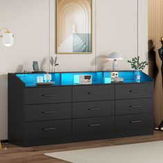 a black and blue dresser in a white room