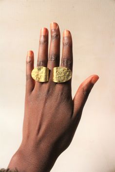 Handcrafted in Nairobi,Kenya. Crafted with brass. A beautiful statement ring! Size 8US. SHIPPING Express shipping (via DHL) takes 3-8 WORKING DAYS to be delivered to you. Nickel Free Open Ring Jewelry For Promise, Nickel-free Open Ring Jewelry For Promise, Adjustable Nickel-free Promise Ring, Nickel-free Adjustable Promise Rings, Adjustable Bohemian Style Ring Jewelry, Adjustable Bohemian Style Ring, Handmade Gold Stackable Promise Rings, Bohemian Open Ring Jewelry Gift, Gold Handmade Stackable Promise Rings