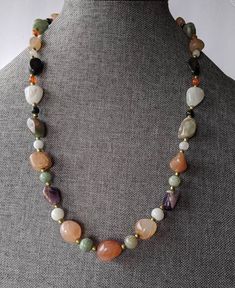 "Multi Gemstone Nugget Necklace Vintage beaded necklace featuring Amethyst, Carnelian, Agate, Black Onyx, Rose Quartz nuggets with brass spacer beads. Necklace has older style barrel clasp. Necklace will arrive gift boxed. * HALLMARKS Unmarked. * MEASUREMENTS 24\" long with 13 to 7mm beads * CONDITION Excellent. * MATERIALS Multi semi precious gemstones." Luxury Traditional Agate Beaded Necklace, Healing Natural Jade Gemstones, Vintage Gemstone Beads Jewelry For Healing, Vintage Gemstone Necklace For Healing, Vintage Healing Gemstone Necklace, Aventurine Gemstone Beads Necklace For Healing, Vintage Jade Necklace With Natural Stones, Vintage Natural Stones Gemstones For Gift, Vintage Natural Stones Gemstones As Gift