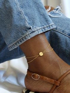 Minimal and dainty, our Lola anklet is perfect for personalization with your initial or the initial of a loved one. This design features duo cable chains - one just a touch longer than the other - in order to achieve a cascading, layered look that is unique and stylish! Made of high quality 14k gold fill or sterling silver, this anklet will shine all summer and every season after - the perfect way to make sure your style stays one step ahead. This listing is for one [1] anklet. | MATERIAL * Gold Trendy Adjustable Ankle Wrap Jewelry, Personalized Adjustable Elegant Anklet, Elegant Personalized Adjustable Anklet, Personalized Adjustable Dainty Anklets, Personalized Dainty Adjustable Anklets, Dainty Personalized Adjustable Anklets, Adjustable Anklets For Gift, Minimalist Anklets For Gift, Dainty Adjustable Ankle Wrap Anklets