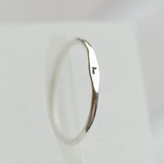 This Initial ring is a cool minimalist piece to add to your stacking set. It is made with a skinny but sturdy band with a hand stamped initial.The ring is 1.2 mm thick and looks very dainty on the finger.*** Customization *** - by default the letter will be LOWER case and oxidized to BLACKApart from the letter you also can customize the initial look. I can make it oxidized to black as you can see in pictures or leave it silver. I also can use lower case or upper case letters. Just let me know th Upper Case Letters, Lower Case, Initial Ring, Upper Case, Slovakia, Lowercase A, Stackable Rings, Engagement Ring Settings, Silver Band