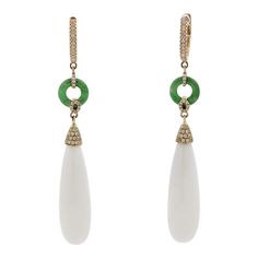 A stylish and chic pair of drop earrings! They feature 27.35 carats of smooth drop-shaped white onyx. Accenting them are 0.41 carats of round brilliant-cut diamonds which add sparkle and brilliance to the piece. Finishing the earrings are two jadeite jade hoops which add length and contrast in color to this unique piece. Made in 18k rose gold and ready to be enjoyed.      Length: 2.5 inches    Weight: 9.2 grams Luxury Teardrop Diamond Earrings, Luxury Teardrop Earrings With Diamond Accents, White Pear-shaped Earrings With Diamond Accents, Luxury White Pear-shaped Earrings, White Diamond Accented Pear-shaped Teardrop Earrings, White Pear-shaped Teardrop Earrings With Diamond Accents, Classic White Teardrop Earrings With Diamond Accents, White Diamond-accented Teardrop Earrings, Luxury White Earrings With Pave Setting