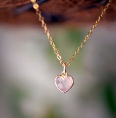 Looking for a unique accessory for some self love, or love for that special someone? Crafted from 14k gold filled and natural Rose Quartz, this pendant is the perfect, sparkling way to show anyone how much you care. Rose Quartz is a stone of love. It is believed to restore trust & harmony in relationships and encourage unconditional love. It purifies the heart and promotes self love, inner healing, and friendship. It is an alternate birthstone for January, as well as the spiritual birthstone for Delicate Jewelry With Heart Charm For Mom, Delicate Heart Charm Jewelry For Mom, Delicate Heart Charm Jewelry As Gift For Mom, Delicate Jewelry With Heart Charm For Mom's Gift, Delicate Heart Charm Jewelry Gift For Mom, Delicate Valentine's Day Jewelry, Delicate Heart Necklace For Mother's Day, Delicate Pink Gold Jewelry For Gift, Delicate Heart Cut Jewelry Gift