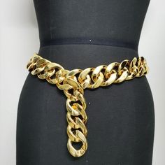 Marca:8888 China Queens
            
        Drag Queen accessories Looking to elevate your drag queen accessories game? Look no further than our Drag Queen Shop`s Versatile Belt Chain in a gorgeous gold color. Made from durable plastic, this waist chain is the perfect addition to any outfit, whether you`re on stage or off. With a width of 4cm and a length of 105cm, it`s the perfect size to make a statement without overpowering your look. Whether you`re looking to add a touch of glamour to a sim Gold Body Chain For Parties, Gold Metal Body Chain, Elegant Gold Body Chain With Chain Strap, Glamorous Gold Body Chain With Chain Strap, Gold Body Chain With Adjustable Chain For Party, Gold Adjustable Body Chain For Party, Glamorous Gold Body Chain, Chic Gold Body Chain For Party, Chic Gold Metal Body Chain