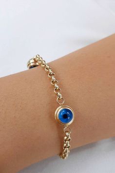 This 14k Gold Evil Eye Bracelet, Evil Eye Rolo Chain Gold Bracelet, 1 3 5 Blue Eyes Real Gold Station Bracelet is Gift for Her gift for Mother Bracelets that on photo are 8.0 mm evil eye bracelet and 9.0 mm evil eye bracelet Material: 14K Solid Gold (Real fine Gold) Gold color: Only yellow gold Available Eye Charm Size: 6 mm eye means ; 6.00 - 6.30 mm 7 mm eye means ; 7.50 - 7.70 mm 8 mm eye means ; 8.50 - 8.70 mm 9 mm eye means ; 9.50 - 9.70 mm 10 mm eye means ;10.20 - 10.30 mm You can customiz Blue Gold Plated Jewelry With Charms, Elegant Blue Chain Bracelet As Gift, Dainty Blue Beaded Round Bracelets, Elegant Blue Chain Bracelet For Gift, Dainty Blue Round Beaded Bracelets, Dainty Blue Beaded Bracelets, Dainty Blue Chain Jewelry, Blue Gold-plated Jewelry With Charms, Blue Metal Jewelry With Adjustable Chain