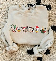 View items Disney Friends Christmas Sweatshirt, Mickey Christmas Sweatshirt: Price, size, color, shipping time on printerval.com now! Disneyland Vintage, Disneyland Christmas, Disney Christmas Shirts, Coffee Christmas, Minnie Christmas, Friends Sweatshirt, Merry Christmas Vintage, Santa Shirt, Mickey Christmas